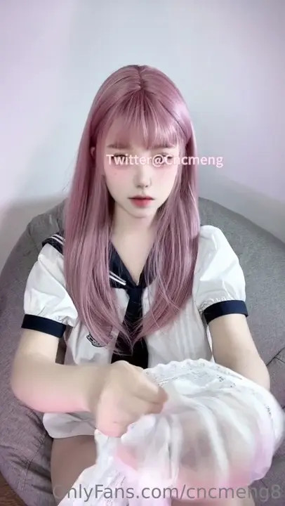 CncMeng Teases With Her Feet And Pussy In A School Uniform