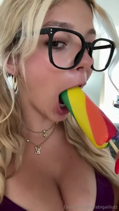 Abigaillutz Sucks Her Rainbow Dildo - ePornLeak