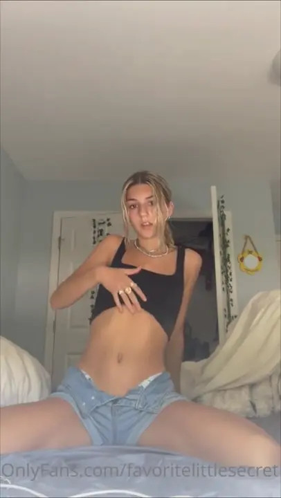 Ambie Bambi Strips And Masturbates On The Bed