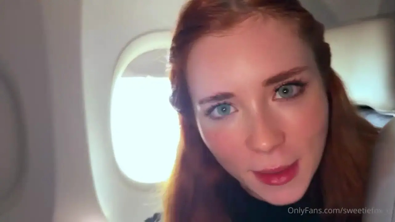 Sweetie Fox Teases Her Pussy On The Plane