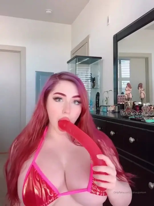 Curvy Redhead Juliette Michele Deepthroats A Huge Red Dildo