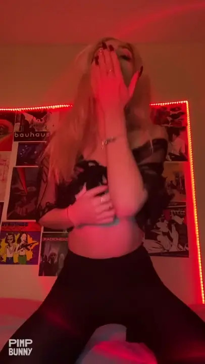 Emily Blonde Undresses And Rubs Her Pussy With Her Fingers