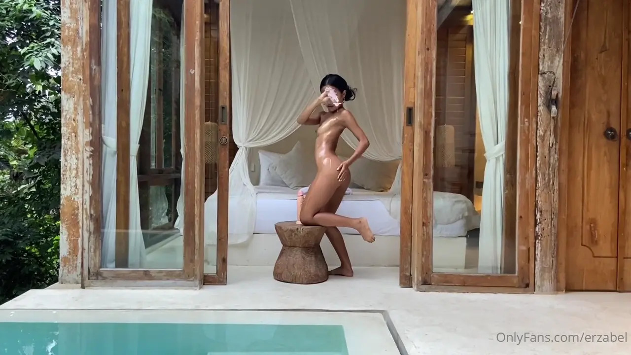 Oiled Erzabelx Thrusts A Dildo In Her Two Holes