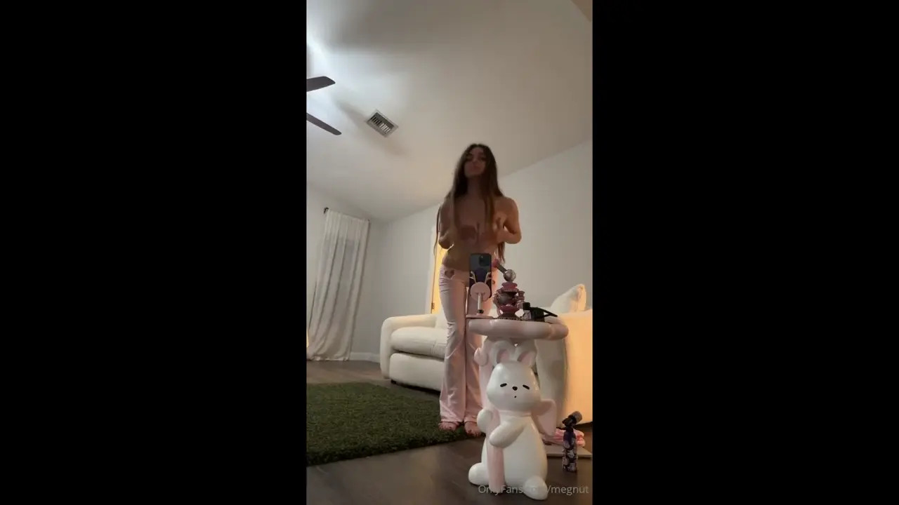 Megnutt02 Slowly Strips To Reveal Her Ass