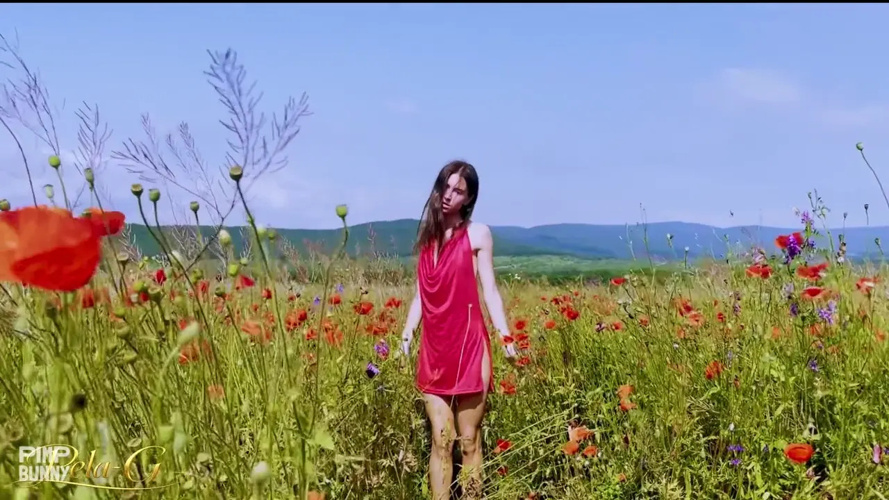 A Slender Beauty Masturbates In A Poppy Field