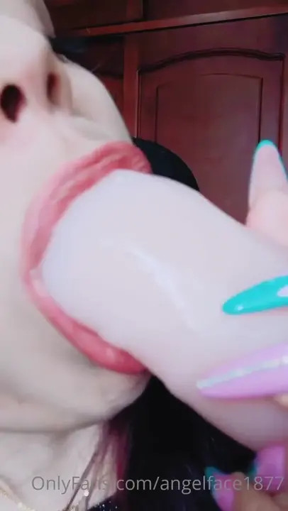 Andrea Castañeda Sucking A Dildo