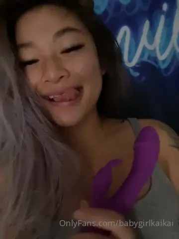 Babygirlkaikai Holding Her Purple Dildo