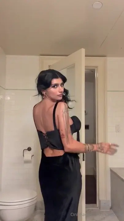 Mia Khalifa Tries On Black Dress After GRWM