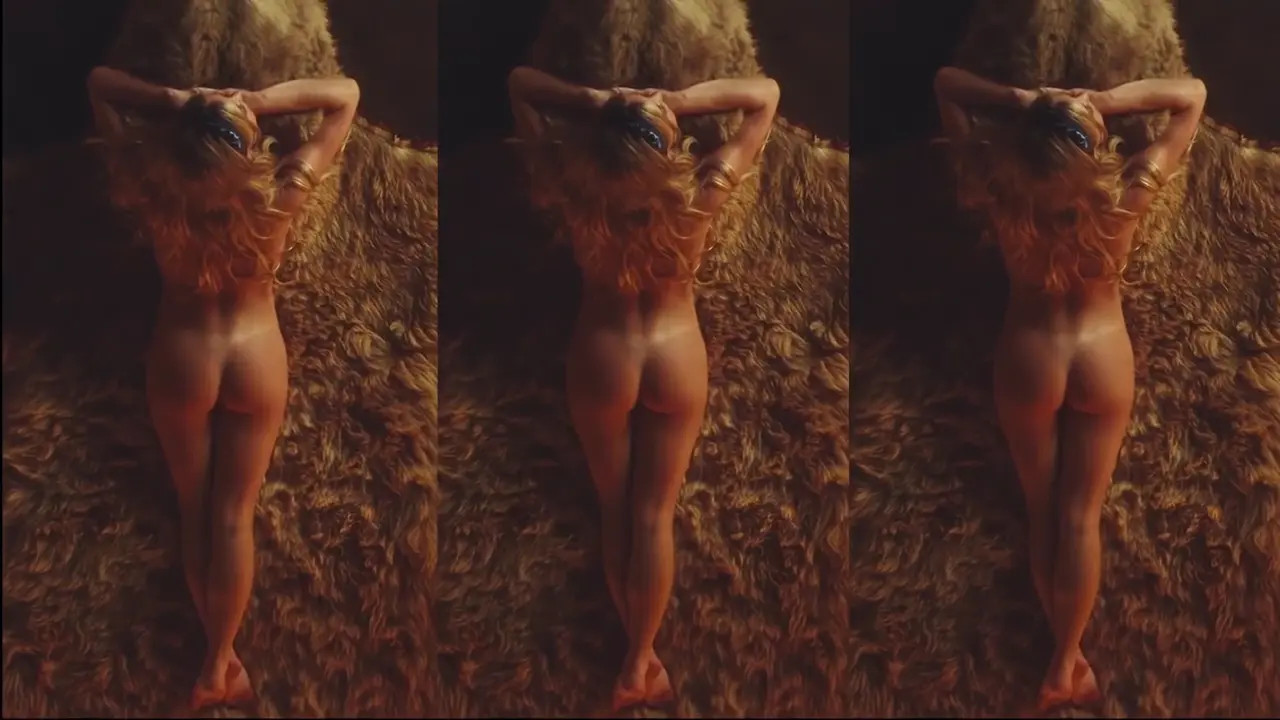 Sydney Sweeney Lays Naked On A Rug