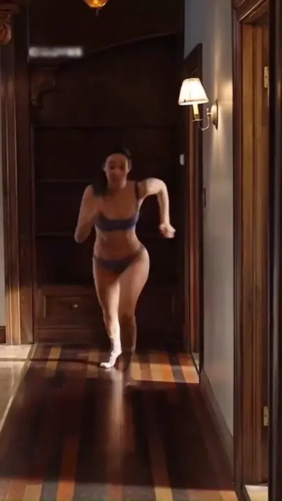 Emmy Rossum Runs In A Sexy Bikini