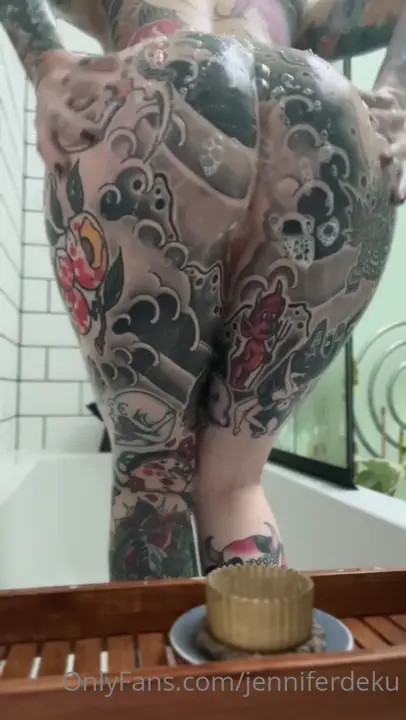 Jenniferdeku Teases Her Nude Tatted Body