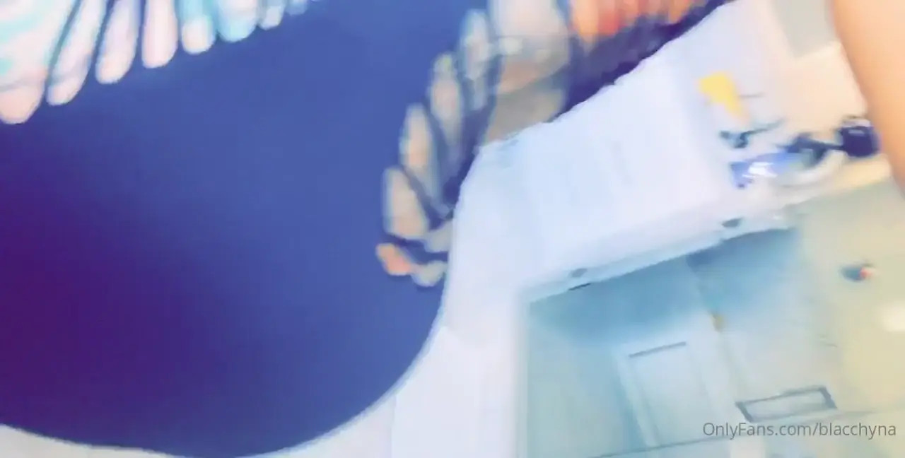 Blac Chyna Models A Stripped Dress